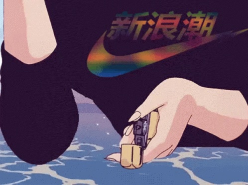 Person In Nike Shirt Holding Lighter GIF