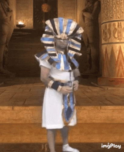 Person in Pharaoh Costume at Building
