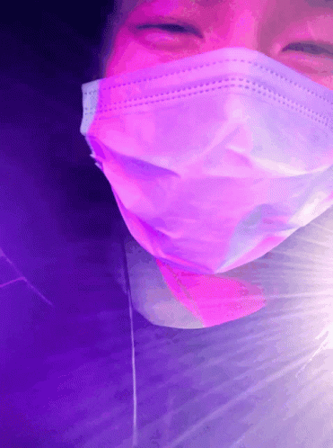 Person in Pink Face Mask