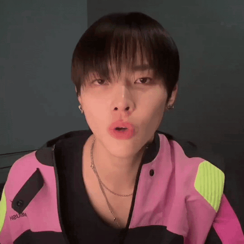 Person in Pink Jacket Saying Hawaii