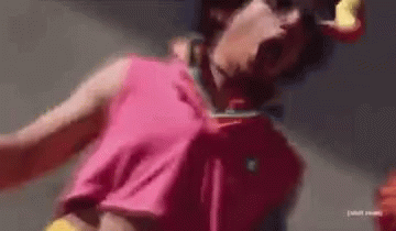 Person in Pink Shirt and Yellow Belt