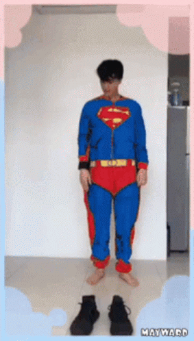 Person in Purple Outfit Before Red Box