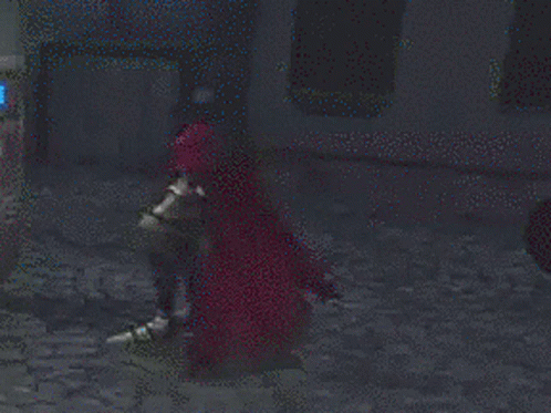 Person in Red Cape Walking in Dark