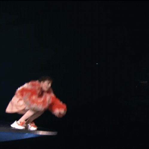 Person In Red Dress Jumping GIF