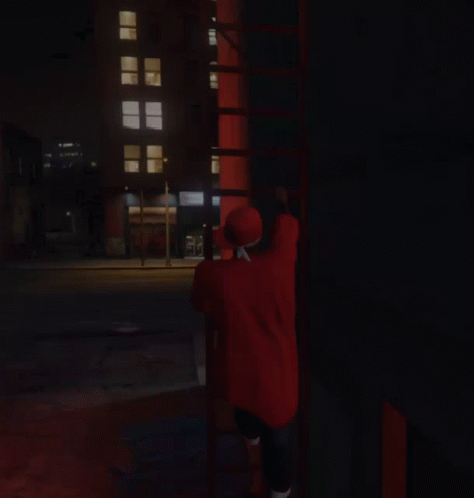 Person in Red Graffiti Shirt Doing Handstand