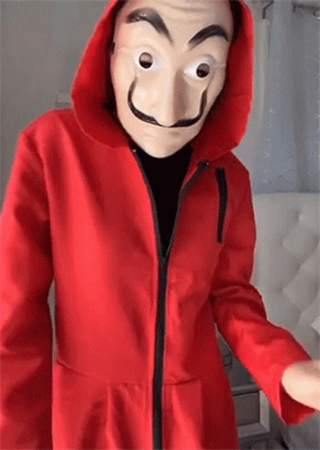 Person in Red Hoodie and Mask
