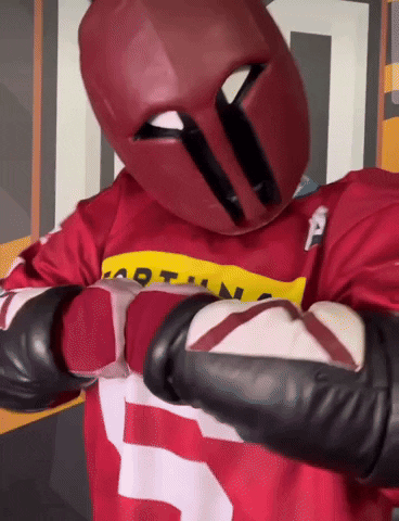 Person in Red Jersey With Letter P