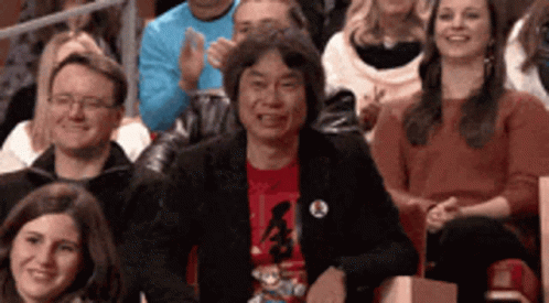 Person in Red Nintendo Shirt