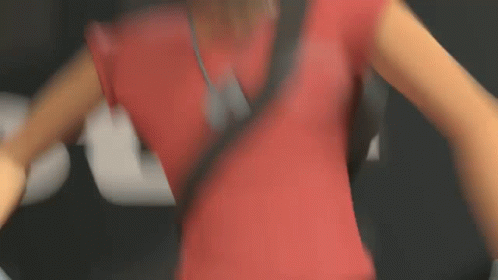 Person in Red Shirt With Black Waist Strap