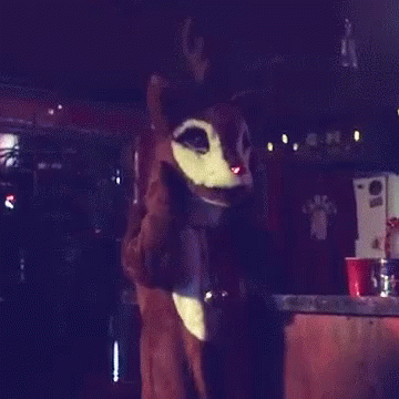 Person In Reindeer Costume With Bell GIF