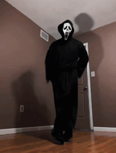 Person in Scream Costume Walking