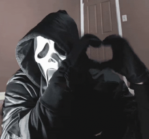 Person In Scream Mask And Black Hood GIF