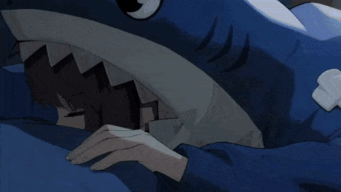 Person In Shark Costume Laying On Bed GIF