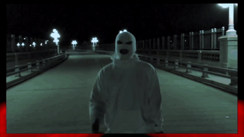 Person In Ski Mask On Bridge GIF