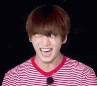 Person In Striped Shirt Laughing GIF
