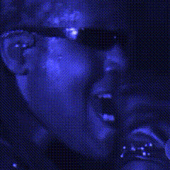 Person In Sunglasses In Dark Room GIF