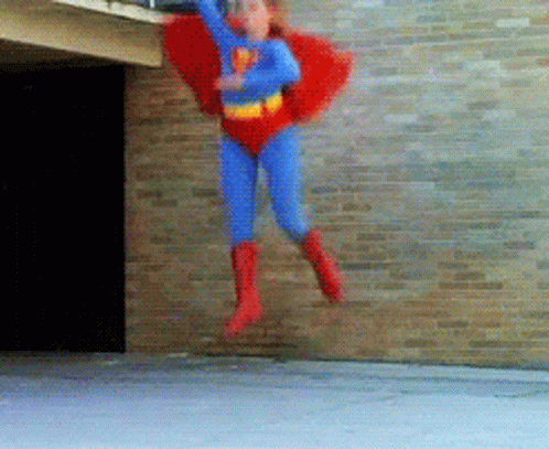 Person in Superman Costume Flying