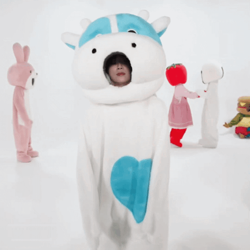 Person In Teddy Bear Costume And Blue Hat GIF