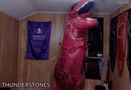Person In Thunderstones Costume By Wooden Wall GIF
