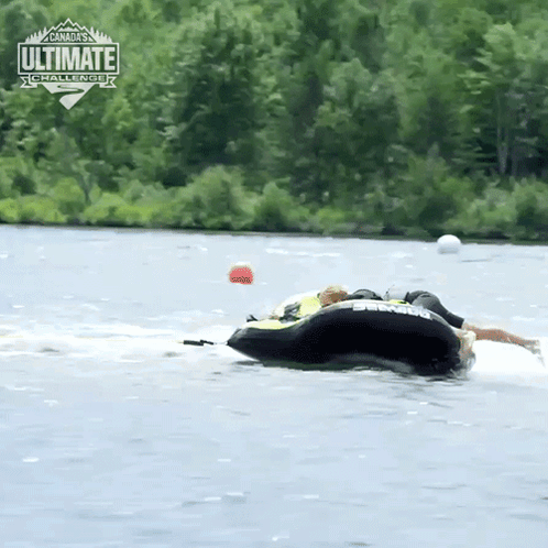 Person In Tube Towed By Boat Saying Ultimate Challenge GIF