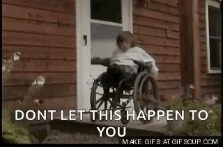 Person In Wheelchair Sitting On House Steps GIF