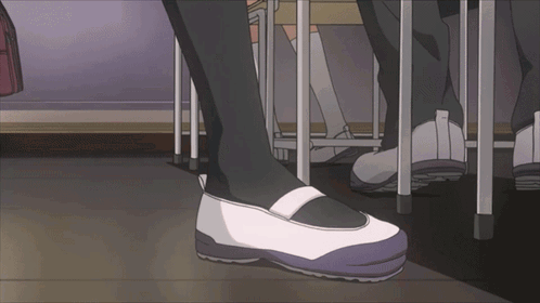 Person in White Shoes With Blue Sole