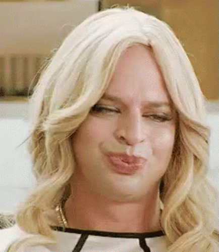 Person in Wig Making Funny Face
