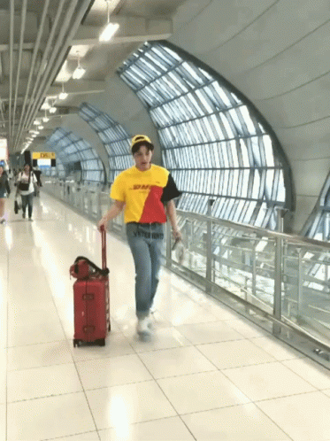 Person in Yellow Shirt with DHL