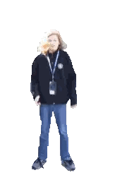 Person Jumping in Black Sweater and Blue Jeans