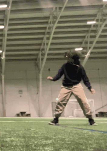 Person Jumping in Indoor Arena