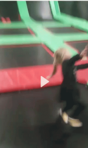 Person Jumping on Trampoline