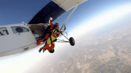 Person Jumping Out of Airplane With Number 17
