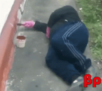 Person Kneeling Painting Wall