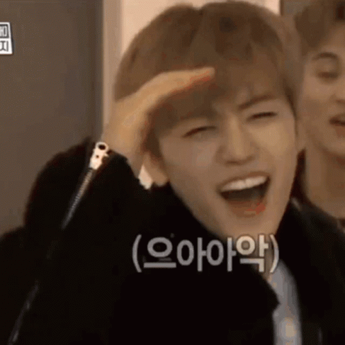 Person Laughing with Hand on Head