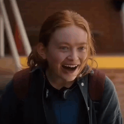 Person Laughing With Mouth Open And Backpack GIF