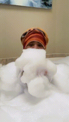 Person Laying In Bathtub With Foam Coming Out Of Mouth GIF