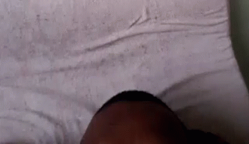 Person Laying on Bed with Eyes Closed