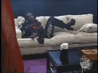 Person Laying on Couch With Feet Up