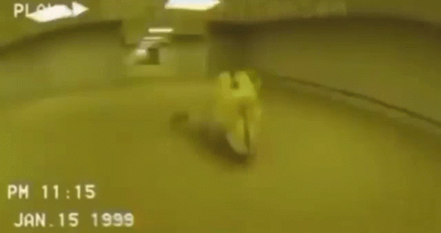 Person Laying on Floor in Yellow Room