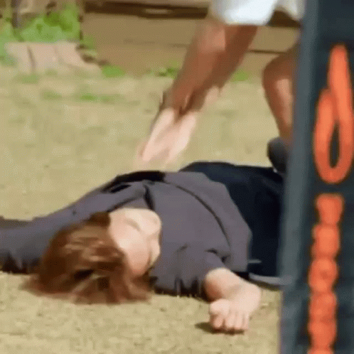 Person Laying on Ground Jumped Over