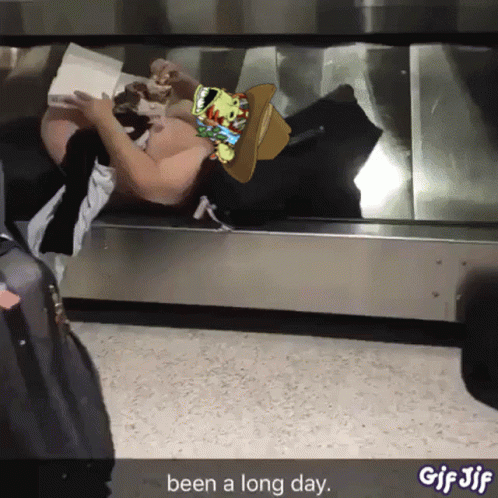 Person Laying on Suitcase Saying Been a Long Day