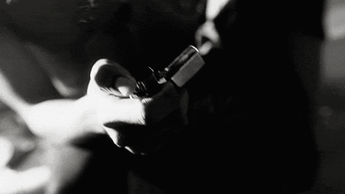 Person Lighting Cigarette Black And White GIF