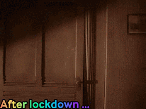 Person Looking Out Window After Lock Down