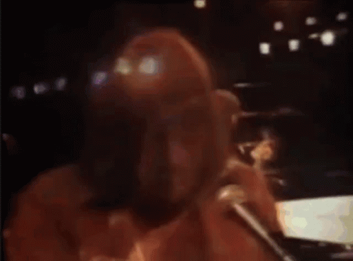 Person Lying On Bed In Dark Room GIF