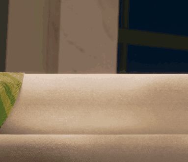 Person Lying on Bed with Green Blanket