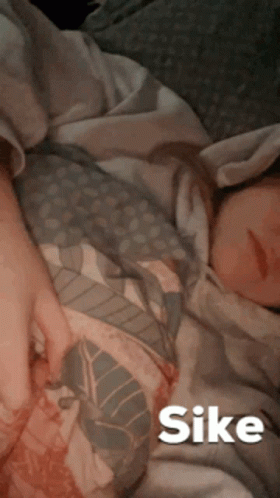 Person Lying on Bed with Sike