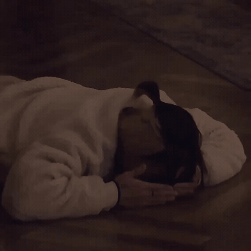 Person Lying On Floor With Towel GIF