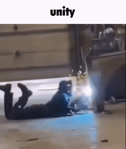 Person Lying On Ground With Unity Above GIF