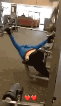 Person Lying on Gym Machine with Legs Up
