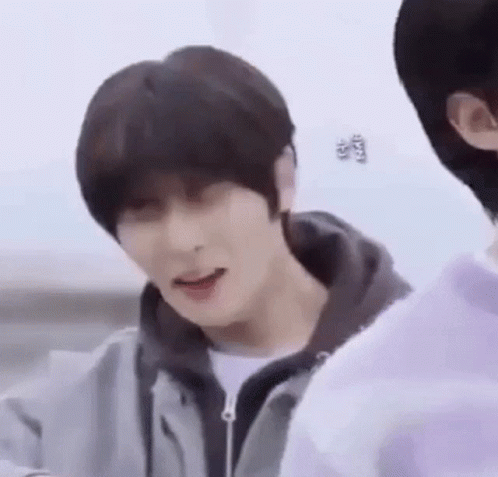 Person Making Funny Face In Hoodie GIF